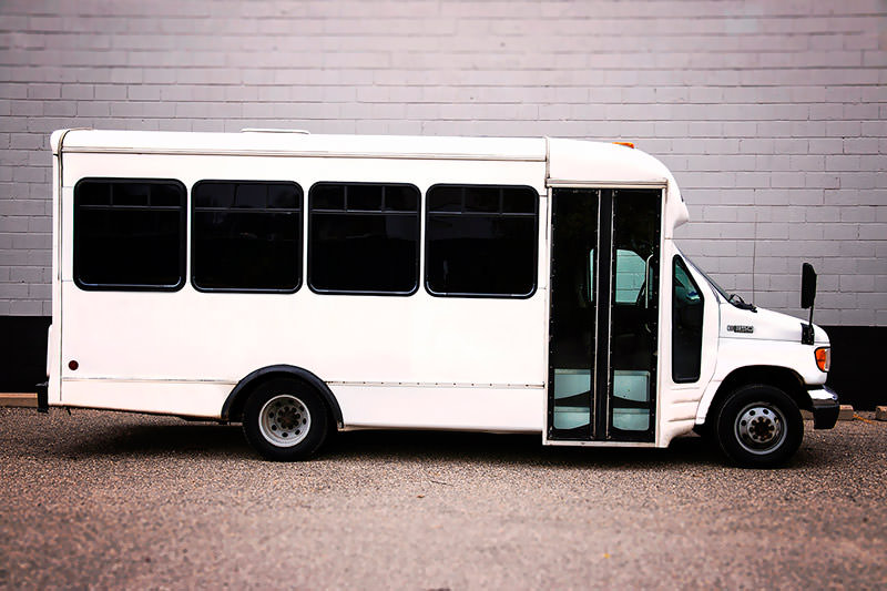 Clean white exterior of the 20 passenger party bus