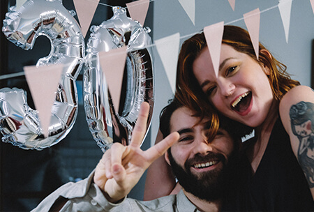 A couple enjoying a 30th birthday party