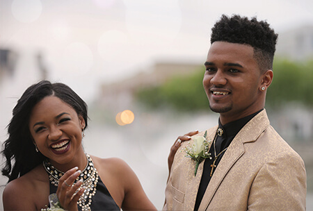 A young couple together on their prom night